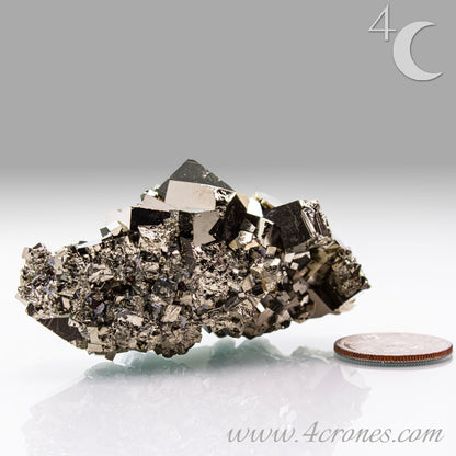 Shangbao Pyrite is a variety of pyrite, a sulfide mineral with the chemical formula FeS₂. Known for its metallic luster and brassy gold color, pyrite crystallizes in the isometric system, often forming cubic, octahedral, or pyritohedral crystals.