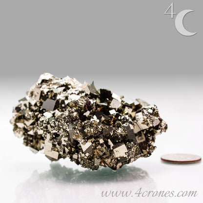 Shangbao Pyrite is a variety of pyrite, a sulfide mineral with the chemical formula FeS₂. Known for its metallic luster and brassy gold color, pyrite crystallizes in the isometric system, often forming cubic, octahedral, or pyritohedral crystals.