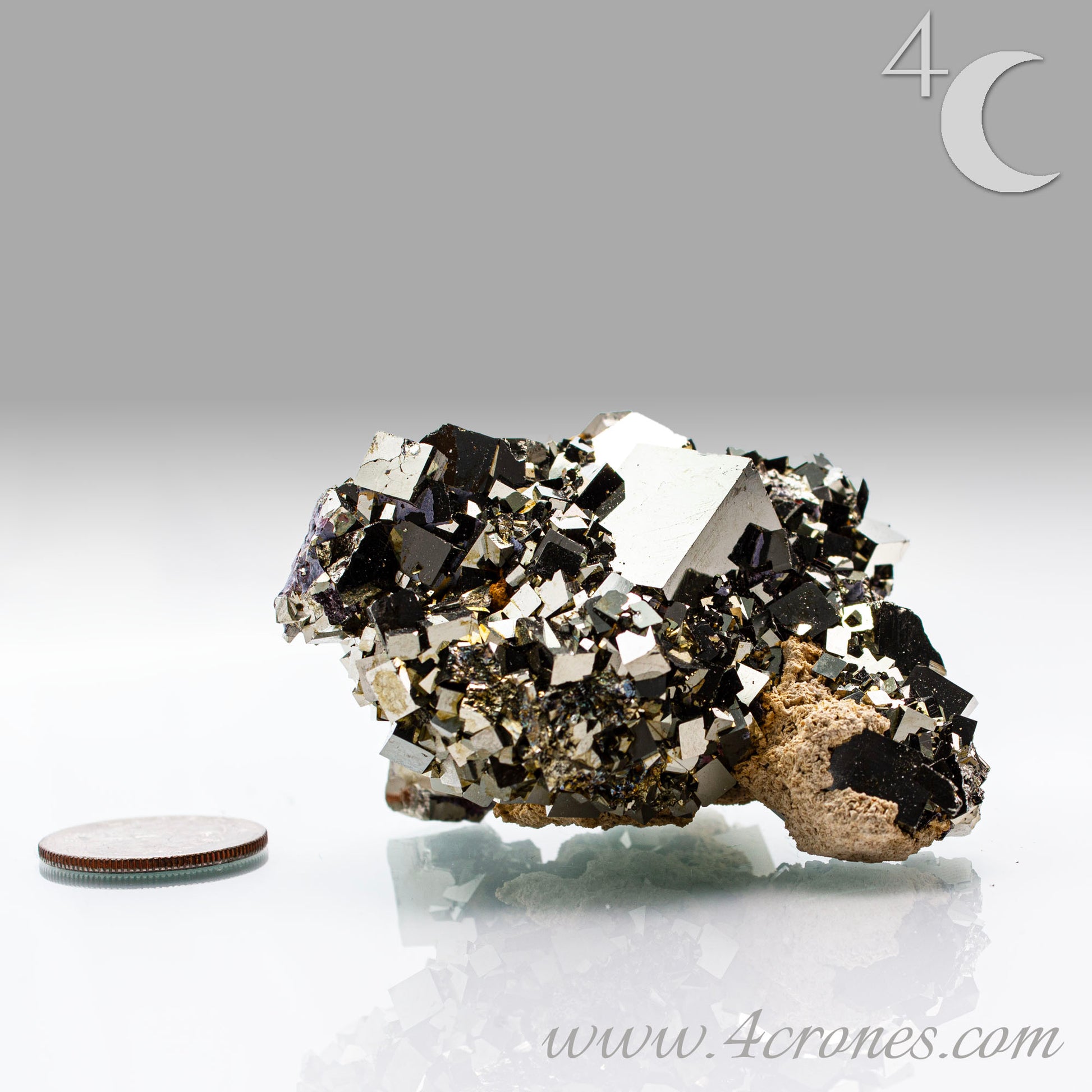 Shangbao Pyrite is a variety of pyrite, a sulfide mineral with the chemical formula FeS₂. Known for its metallic luster and brassy gold color, pyrite crystallizes in the isometric system, often forming cubic, octahedral, or pyritohedral crystals.