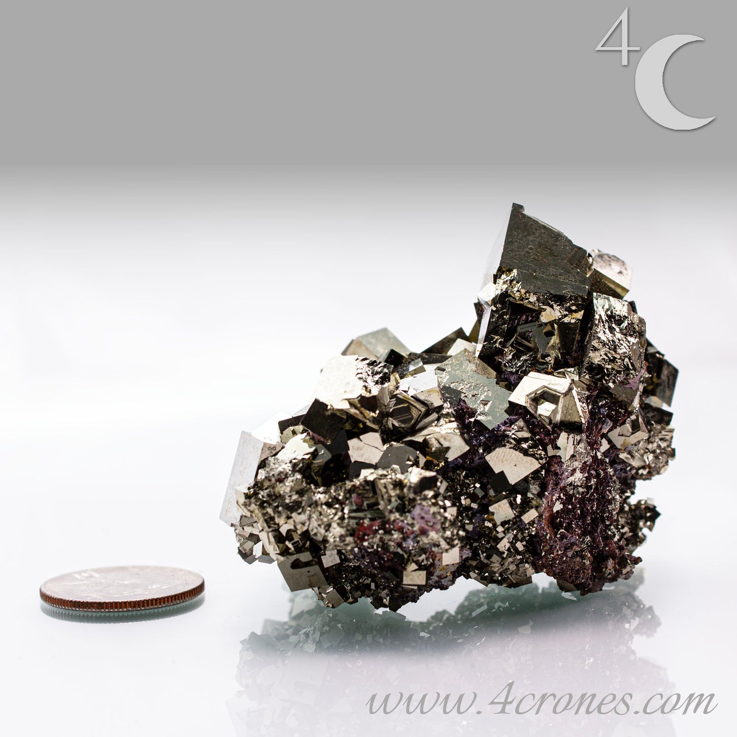 Shangbao Pyrite is a variety of pyrite, a sulfide mineral with the chemical formula FeS₂. Known for its metallic luster and brassy gold color, pyrite crystallizes in the isometric system, often forming cubic, octahedral, or pyritohedral crystals.