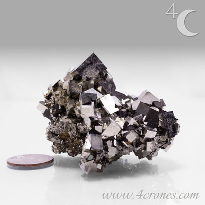 Shangbao Pyrite is a variety of pyrite, a sulfide mineral with the chemical formula FeS₂. Known for its metallic luster and brassy gold color, pyrite crystallizes in the isometric system, often forming cubic, octahedral, or pyritohedral crystals.