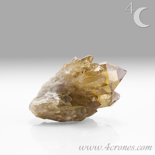 Kundalini Citrine Quartz is a stunning and rare variety of Citrine found exclusively in the Democratic Republic of Congo. This Natural Citrine is also characterized by a distinct formation of multiple terminated smaller Kundalini Quartz crystals.