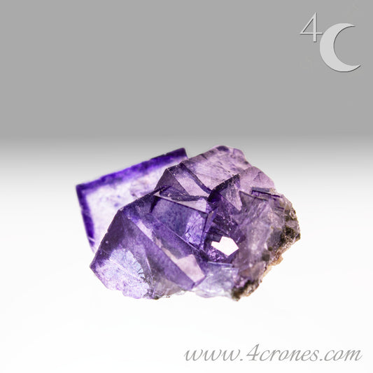 Yaogangxian  fluorite is cherished for its exceptional quality and crisp beauty with stunning water-like cubic crystals and purple-blue phantoms that create a mesmerizing effect.  www.4crones.com