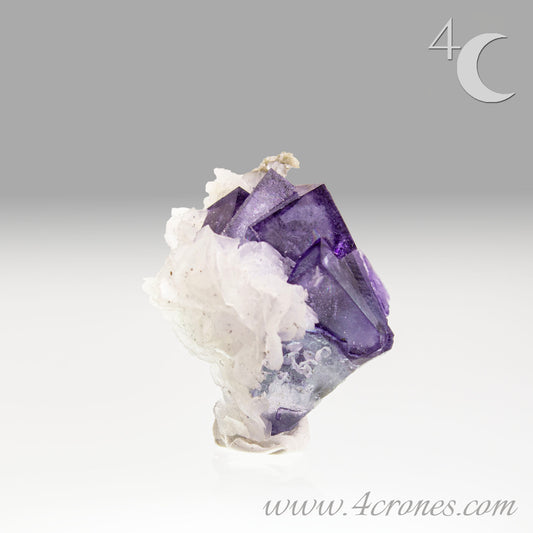 Yaogangxian  fluorite is cherished for its exceptional quality and crisp beauty with stunning water-like cubic crystals and purple-blue phantoms that create a mesmerizing effect.  www.4crones.com