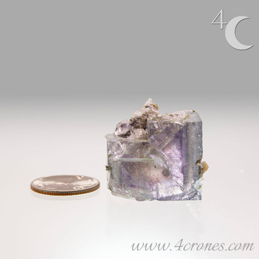 Yaogangxian  fluorite is cherished for its exceptional quality and crisp beauty with stunning water-like cubic crystals and purple-blue phantoms that create a mesmerizing effect.  www.4crones.com