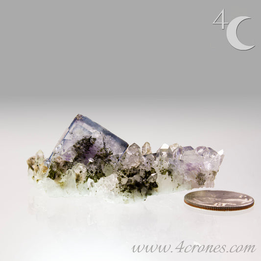 Yaogangxian  fluorite is cherished for its exceptional quality and crisp beauty with stunning water-like cubic crystals and purple-blue phantoms that create a mesmerizing effect.  www.4crones.com