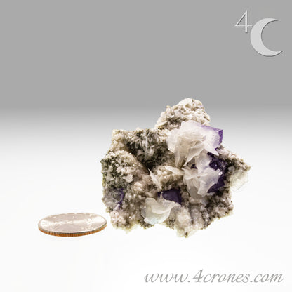 Yaogangxian  fluorite is cherished for its exceptional quality and crisp beauty with stunning water-like cubic crystals and purple-blue phantoms that create a mesmerizing effect.  www.4crones.com