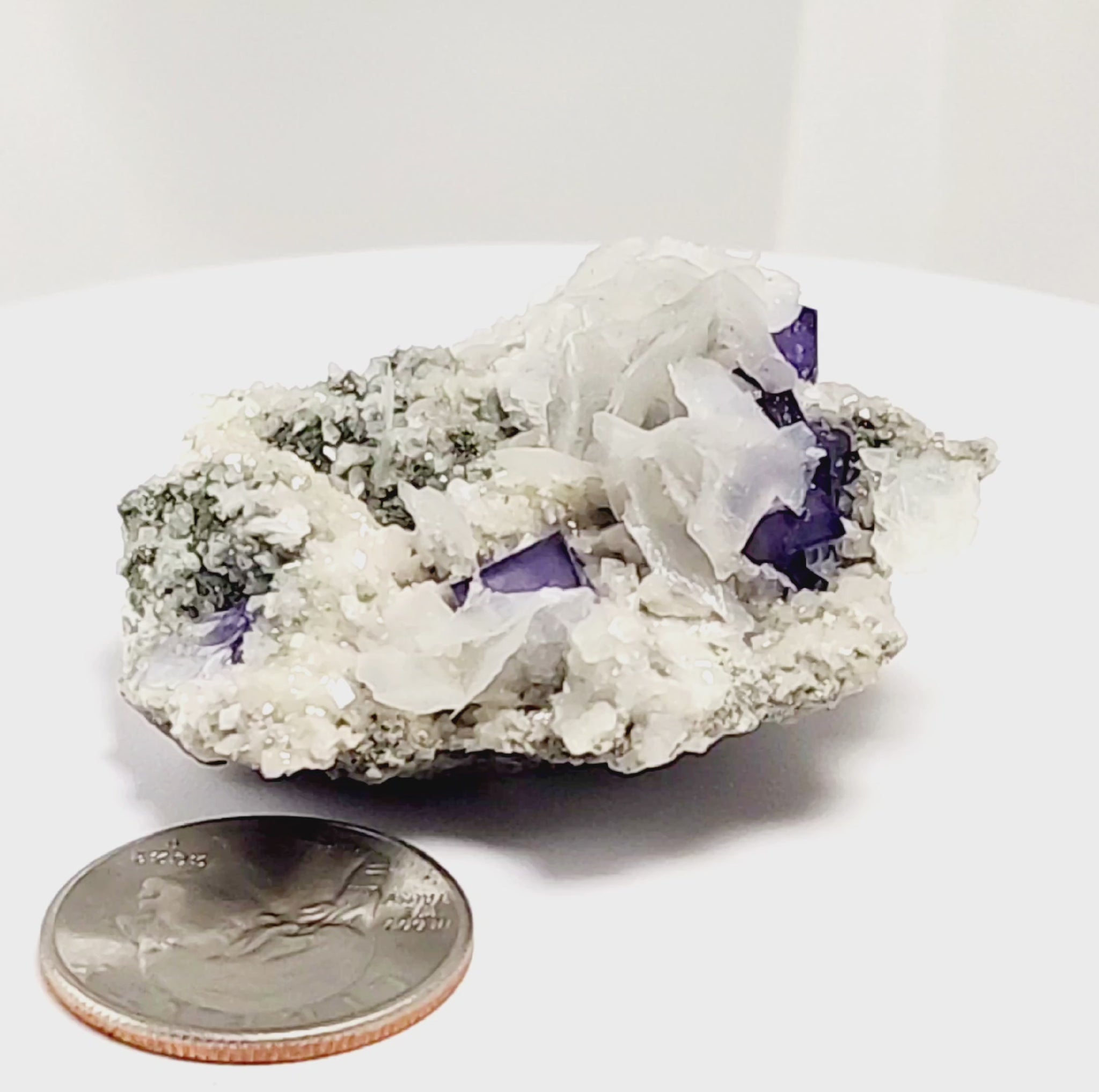 Yaogangxian  fluorite is cherished for its exceptional quality and crisp beauty with stunning water-like cubic crystals and purple-blue phantoms that create a mesmerizing effect.  www.4crones.com